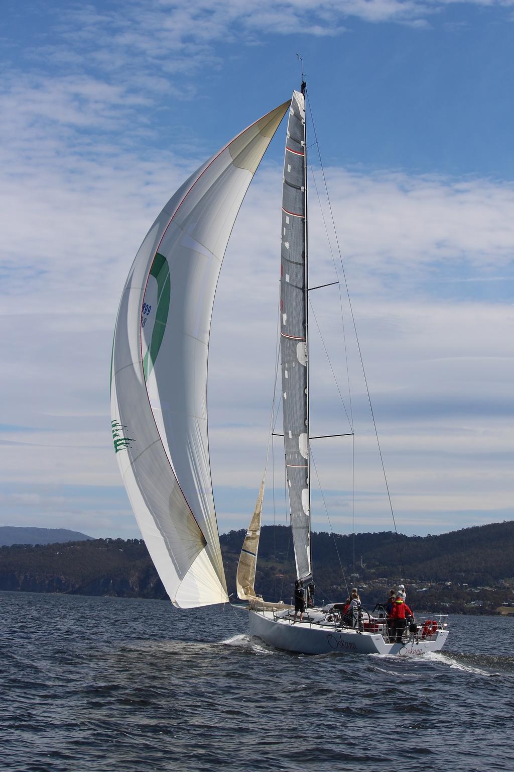 The Cookson 50 Oskana, a Tasmanian entry for the Rolex Sydney Hobart,  had a luckless day, becalmed down the river and losing he big lead. © Peter Watson